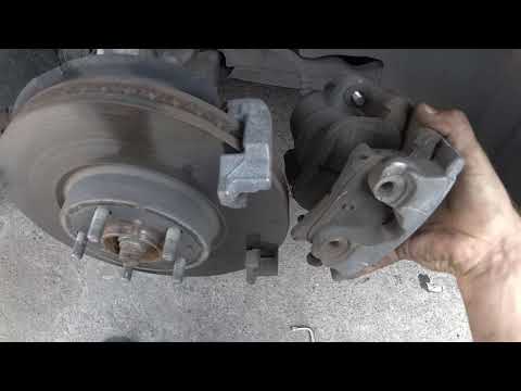 Видео: Замена тормозных колодок Ford Fusion USA