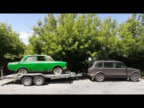 Видео: Перевожу Москвич на новое место стоянки. Нива и прицеп- эвакуатор в помощь.