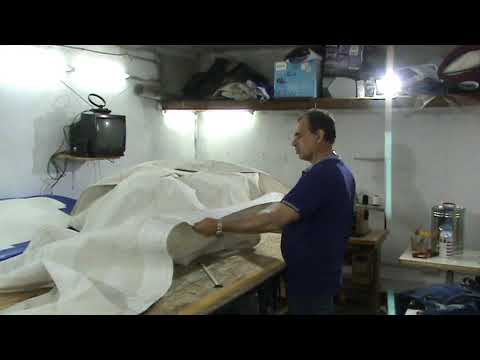 Видео: Ремонт разрывов паруса яхты