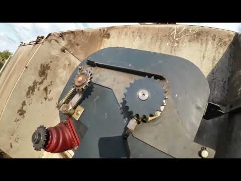 Видео: CLAAS MEGA. Замена зернового элеватора.