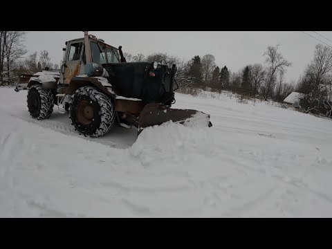 Видео: Чистим снег трактором т150