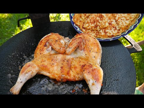 Видео: Вкуснейшая Курица Табака и сырные лепешки на костре. Рецепт без заморочек.