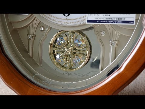 Видео: Обзор Seiko AM257B Wave Symphony музыкальные настенные часы