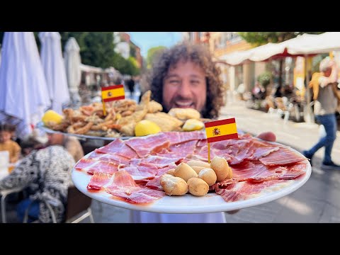 Видео: Пробуем уличную еду в ИСПАНИИ | Страна ветчины 🥩🇪🇸