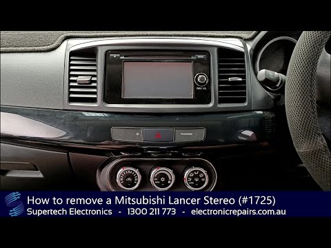 Видео: Как снять магнитолу Mitsubishi Lancer (#1725)