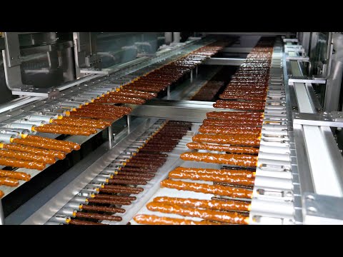 Видео: Гигантская фабрика по производству шоколадных палочек из вращающегося печенья в форме палочки