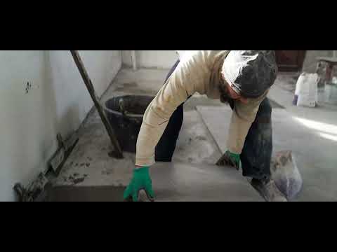 Видео: Ровный слой плиточного клея на неровный пол