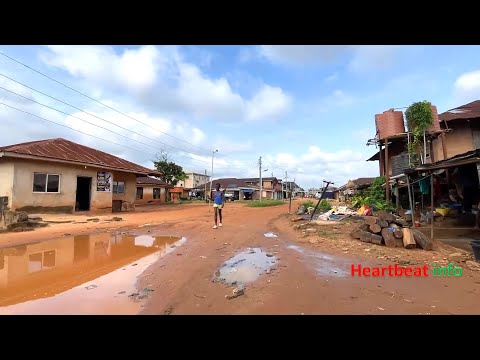 Видео: В глубине города Бенин | Прогулка по штату Эдо