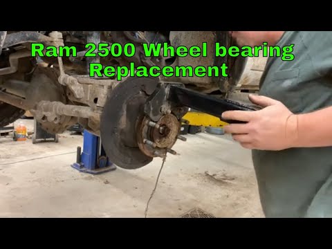 Видео: Замена переднего ступичного подшипника Ram 2500
