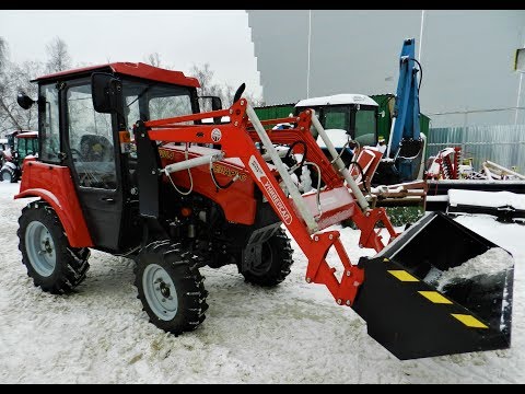 Видео: Мтз 320.4 с погрузчиком универсал 400