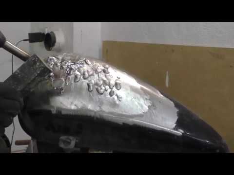 Видео: Рихтовка мотоциклетного бака