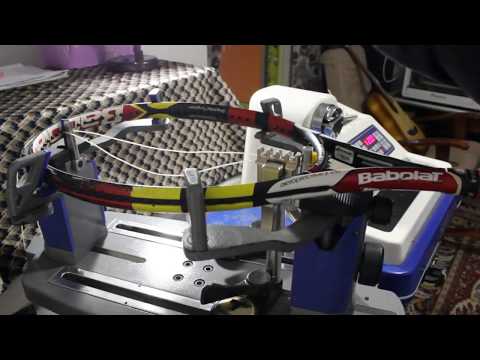 Видео: Перетяжка  струн на теннисной ракетке