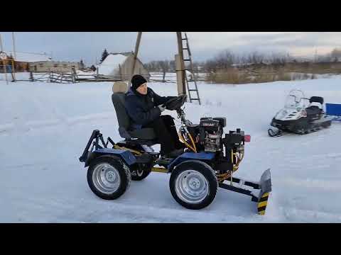Видео: Расчистка снега .Самодельный мини трактор переломка.
