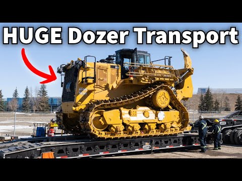 Видео: Буксировка Cat D11 по шоссе