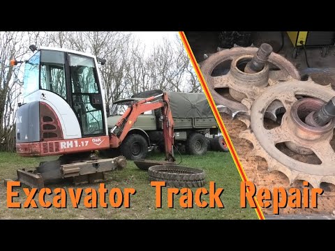 Видео: Мини-экскаватор - Ремонт гусениц