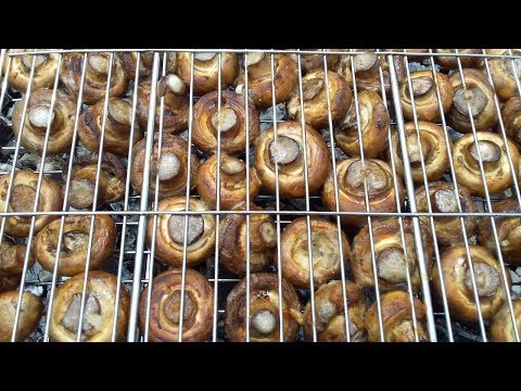 Видео: Шампиньоны на мангале в сочном маринаде. Очень вкусный рецепт приготовления грибов