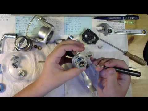 Видео: Катушка Teben COR 400, бейтраннер - разбор-обзор-ТО.