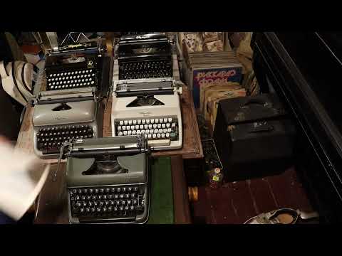 Видео: Олимпия СМ2 обзор | печатная пишущая машинка typewriter Olympia