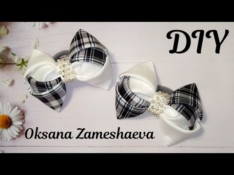 Видео: ОЧЕНЬ ПРОСТО И БЫСТРО ШКОЛЬНЫЕ БАНТИКИ ИЗ РЕПСОВОЙ ЛЕНТЫ 4 СМ