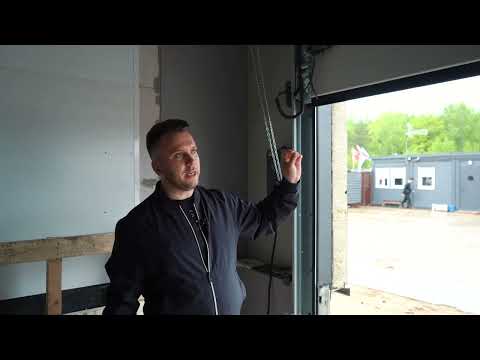 Видео: Обзор промышленных секционных ворот Hormann