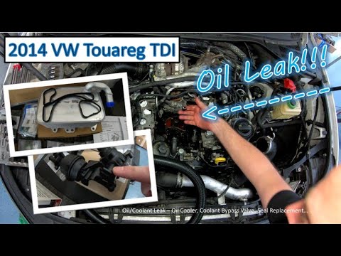 Видео: Утечка масла/охлаждающей жидкости в VW Touareg 2014 года — замена масляного радиатора/обводного к...