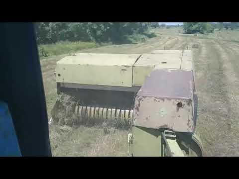 Видео: Трудовые будни с пресс подборщиком fortschritt k 454