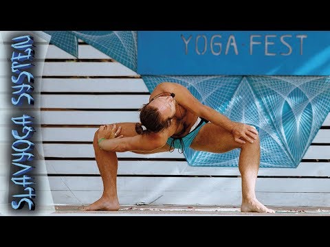 Видео: Асана йоги Паривритта Стамбхасана (винтообразное скручивание)