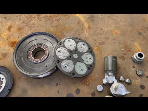 Видео: Устройство компрессора кондиционера Kia Hyundai