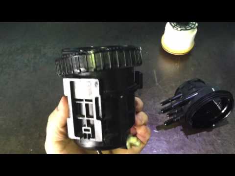 Видео: Замена топливного фильтра дизельного двигателя Ford Ranger Wildtrack