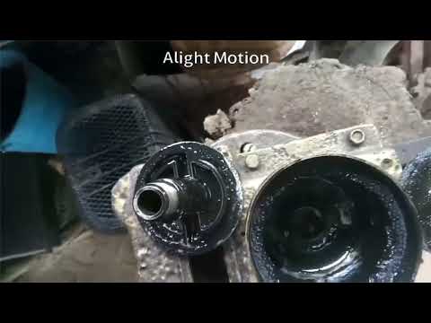 Видео: Заміна моторного мастила в тракторі t40