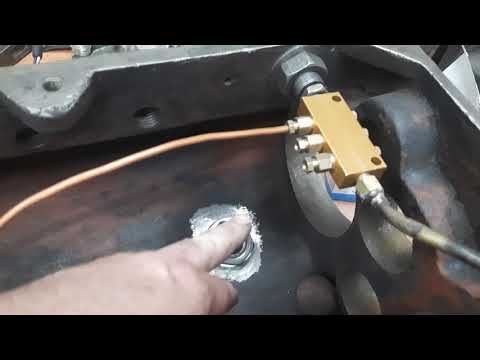 Видео: Система смазки передней бабки станка 1615