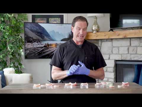 Видео: Варианты и стоимость полной имплантации зубов