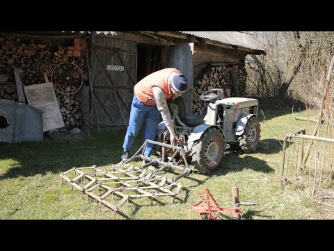 Видео: Первый выезд в поле испытание орудий для навески. Почему глохнет минитрактор.