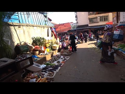 Видео: Сишуанбаньна | Местный рынок | Поменяли гостиницу | Гуляем по городу