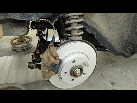 Видео: Audi 100  C3 quattro 1986 г. Сборка тормозной системы задней оси.