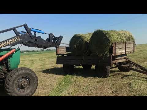 Видео: Грузим рулоны ПРФ-110 куном на ЮМЗ-6АКЛ.