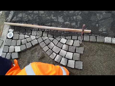 Видео: Арка брусчатка из гранитного камня в переднем дворе