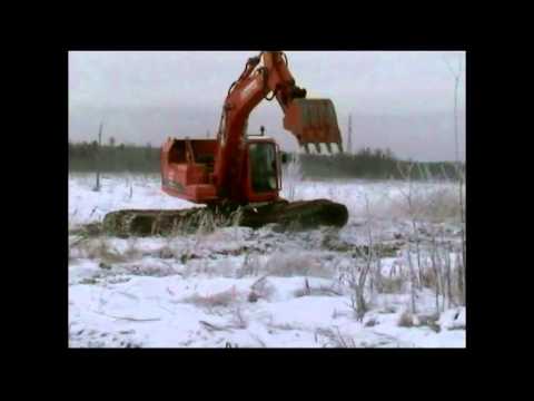 Видео: R-ex 4 Экскаватор - болотоход (зима, лето Film)