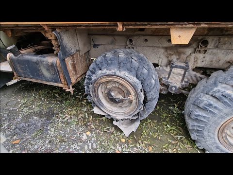 Видео: Попытка замены колеса на Урале.
