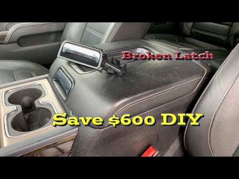 Видео: Открытие и замена защелки консоли Chevrolet/GMC