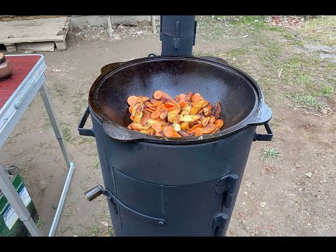 Видео: Пічка під казан. Як обпалити новий казан. Готуємо в казані
