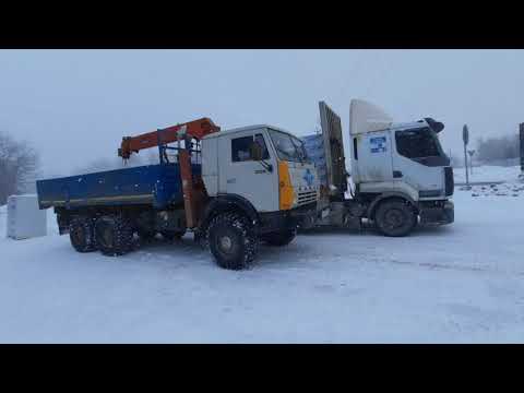 Видео: Газоблок. Доставка и разгрузка на участке.