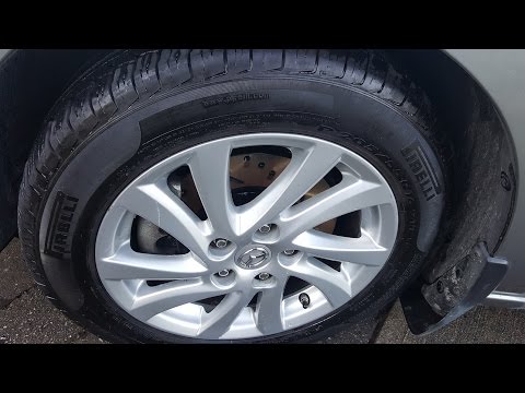 Видео: Передние тормоза на Mazda 5 2012 года