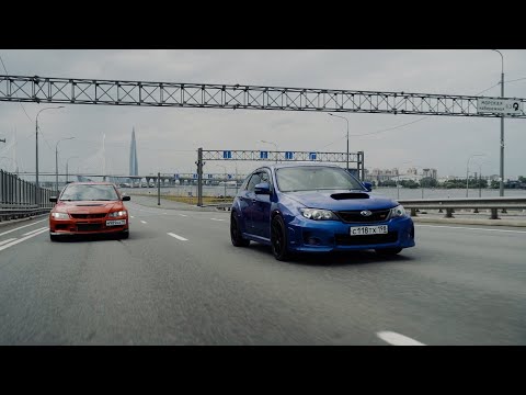 Видео: Легенды ушедшей эпохи. Subaru WRX STI vs Mitsubishi Lancer Evolution.