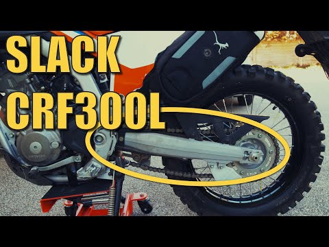 Видео: Регулировка натяжения цепи CRF300L