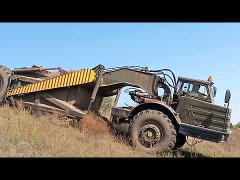 Видео: ШОК скрепер МоАЗ грузится без толкача.