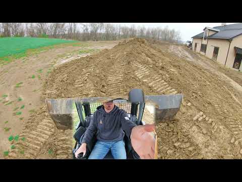 Видео: Как срезать склоны бульдозером