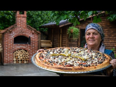 Видео: Пицца с говядиной, приготовленной на дровах
