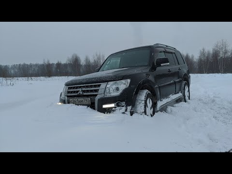 Видео: Pajero 4. Езда по глубокому снегу. Штурмуем сугробы.