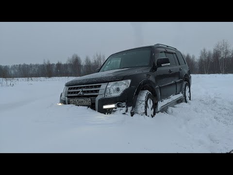 Видео: Pajero 4. Езда по глубокому снегу. Штурмуем сугробы.